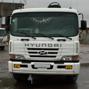 Бортовой автомобиль с кму БУ на шасси HYUNDAI HD 250